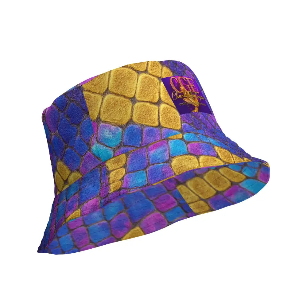 Bossbabe Bucket Hat with vibrant snake print in violet and gold, featuring chains and pearls design