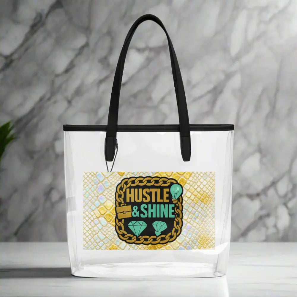 Transparente Tragetasche mit schwarzem Griff und Hustle & Shine Statement-Design