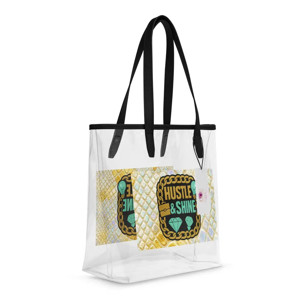 Transparente Tragetasche mit schwarzem Griff und goldenem Hustle & Shine Design