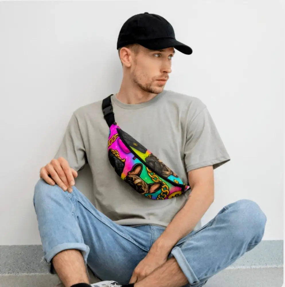 Man wearing a Luxury Glam Crossbody Bag with colorful French Bulldog and gold chain print, styled as a fashionable unisex accessory