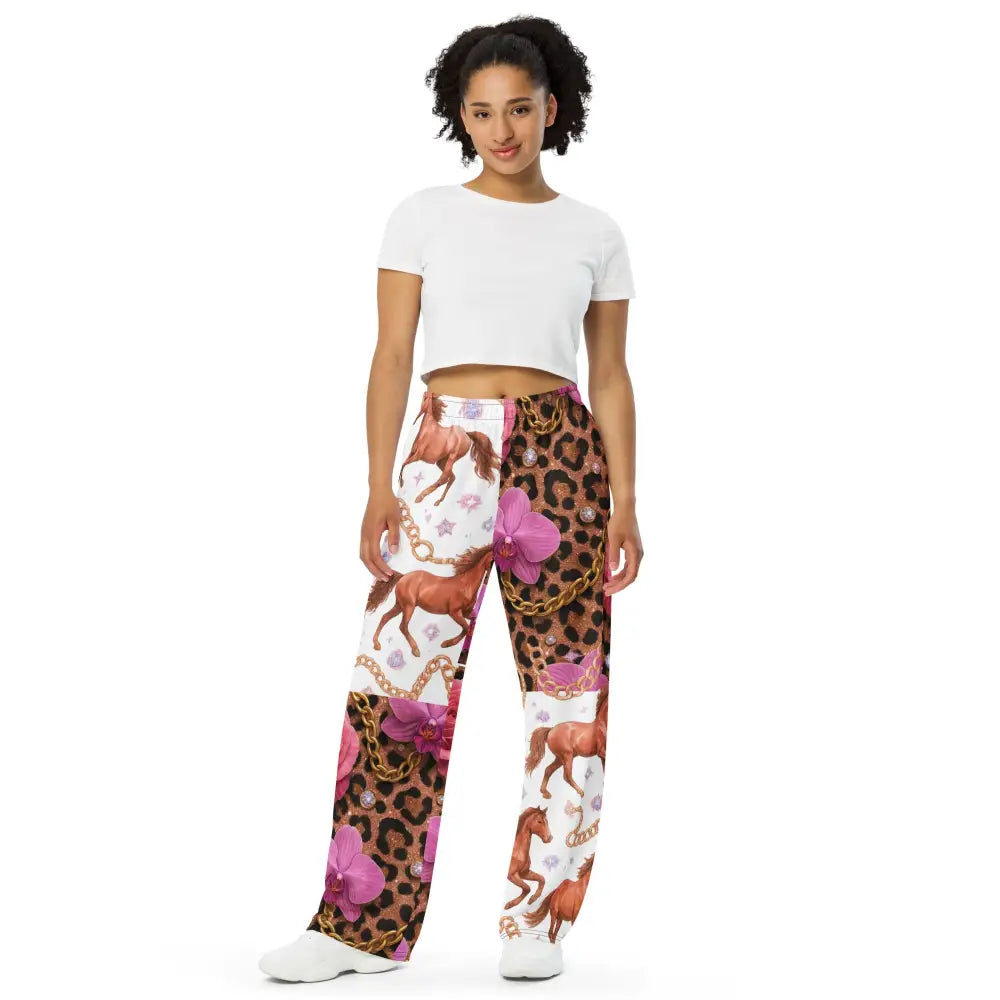Woman wearing Wild Glam Wide Leg Pants with horse, chain, orchid and leopard print design